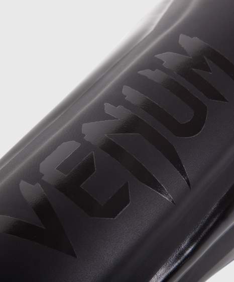Venum Schienbeinschoner Elite, Schwarz