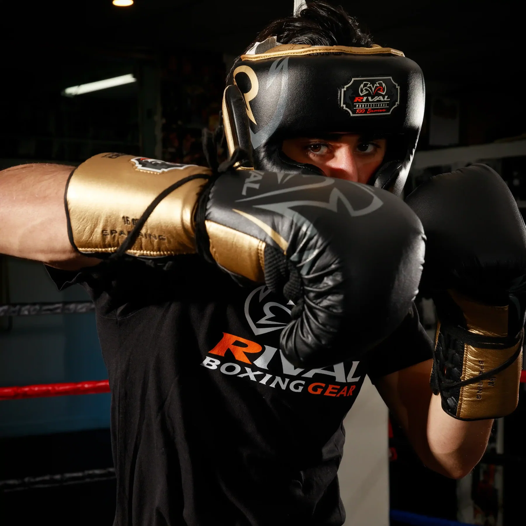 Rival Boxhandschuhe RS100 Professional Sparring mit Schnürung, Schwarz-Gold